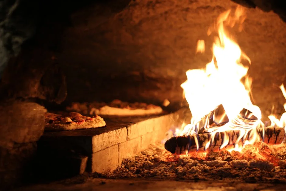 Wood-fired pizza oven with roaring flames and pizzas baking in Naples pizzeria