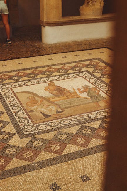 Roman floor mosaic panel in Naples museum gallery with visitors' legs.