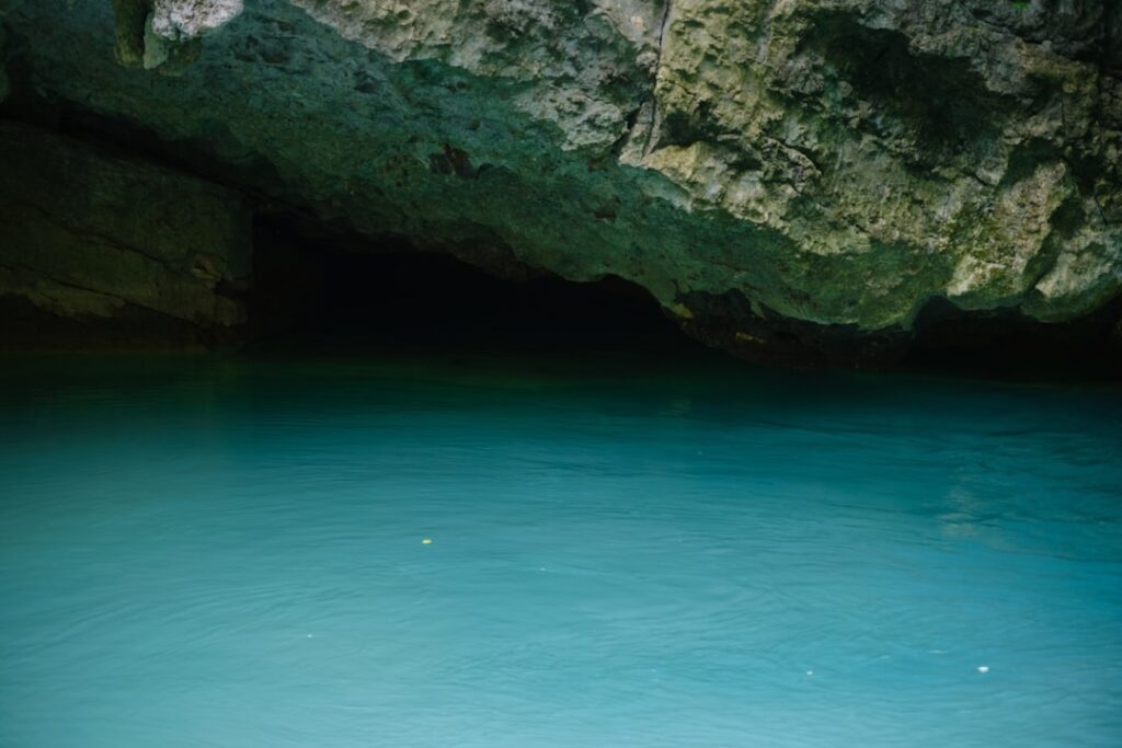 Inside the Blue Grotto with turquoise water and sunlight