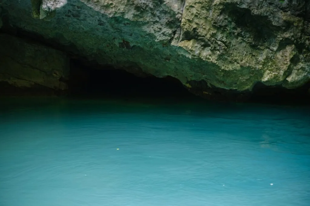 Inside the Blue Grotto with turquoise water and sunlight
