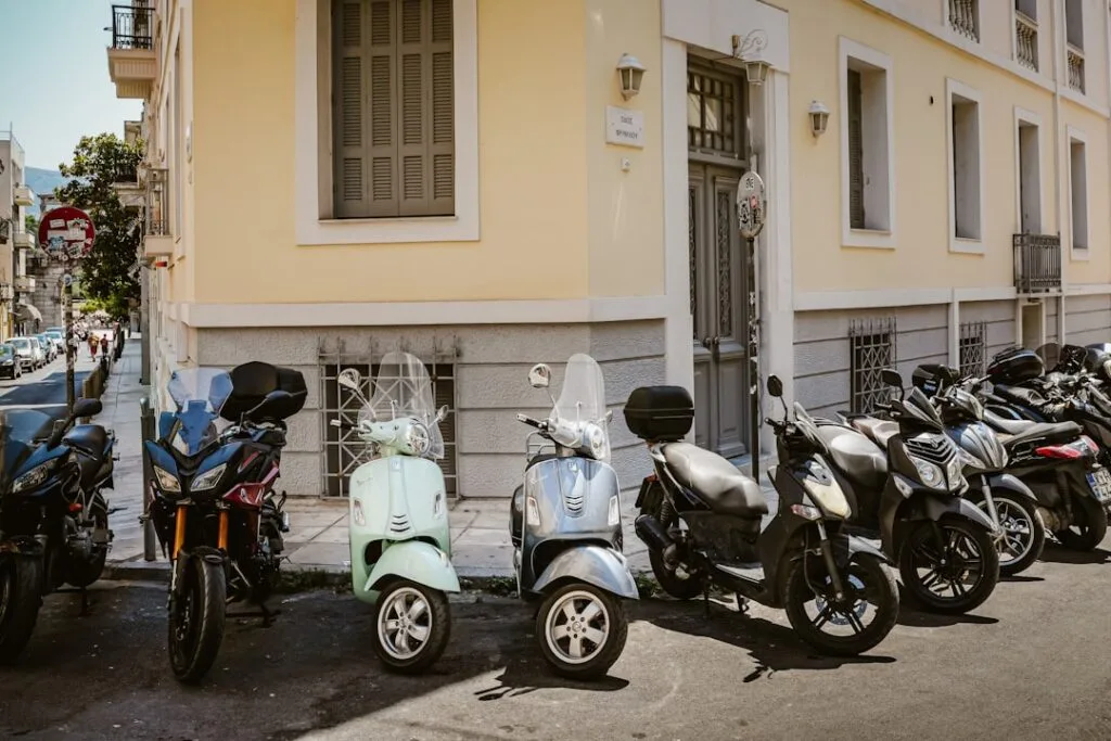 Narrow street in Capri with parked scooters