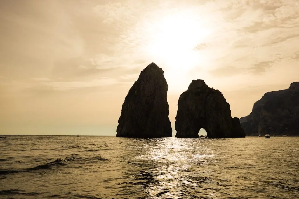 Sunset over Capri with the Faraglioni rocks