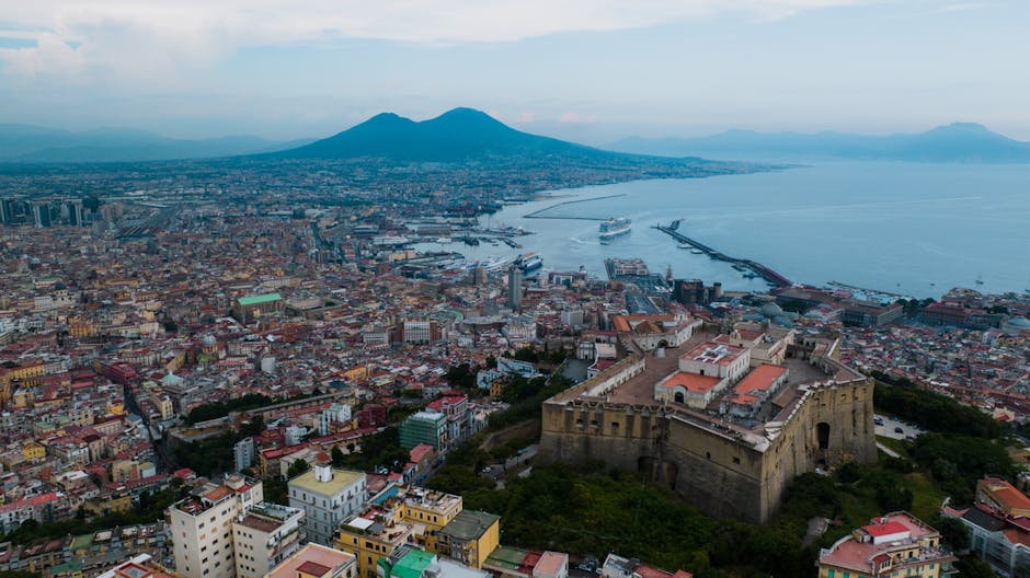 Aerial view of Naples harbour with Mount Vesuvius looming in background