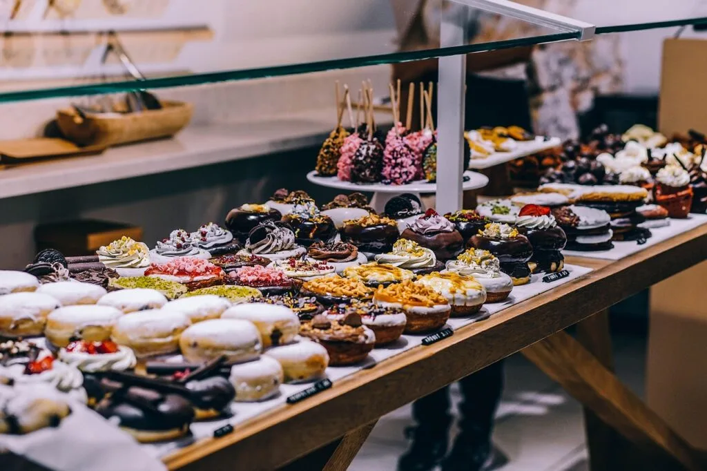 Colorful tray of Italian pastries and donuts in a Naples bakery display