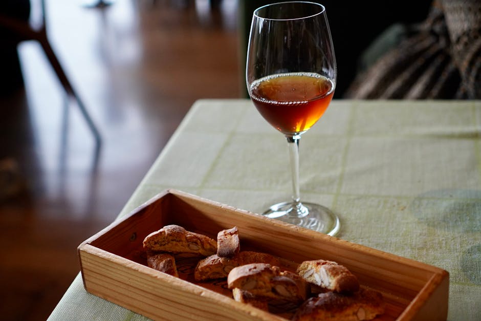 Glass of amber wine and cantucci in a San Gimignano restaurant