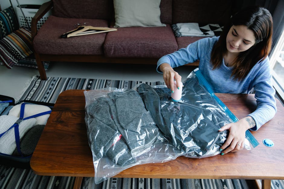 Traveler packing vacuum-packed salumi into a suitcase