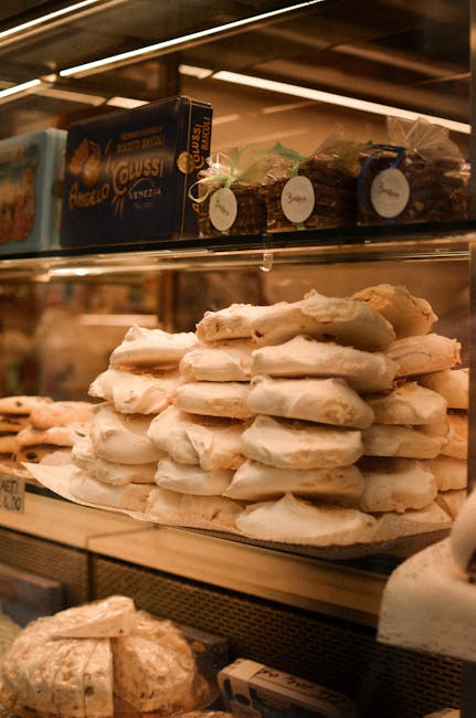 Stack of almond meringues piled inside a San Gimignano pastry case