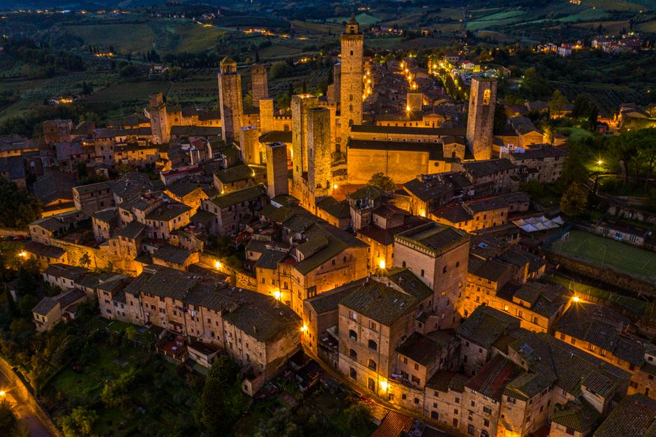Sunset over Tuscan hills viewed from a tower in San Gimignano