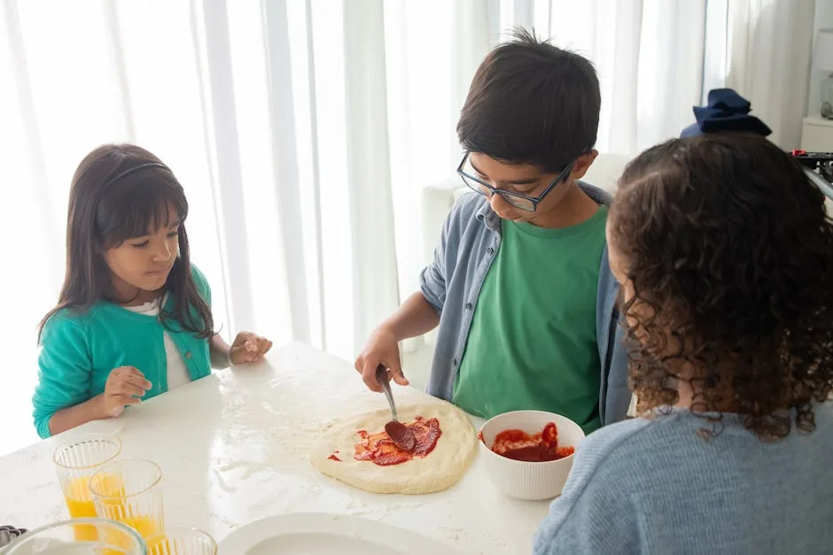 Children making pizza in a cooking class