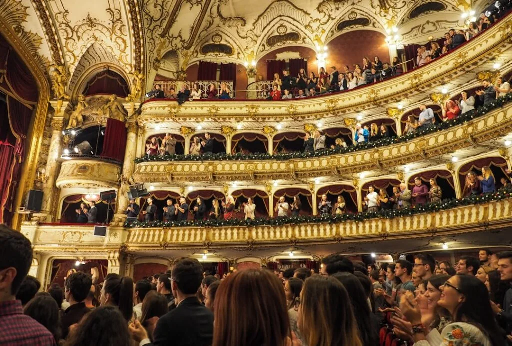 Lucca's ornate theater balconies filled with applauding audience