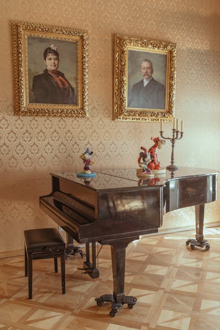 Bambini che ascoltano musica nella stanza dei pianoforti al Museo Puccini