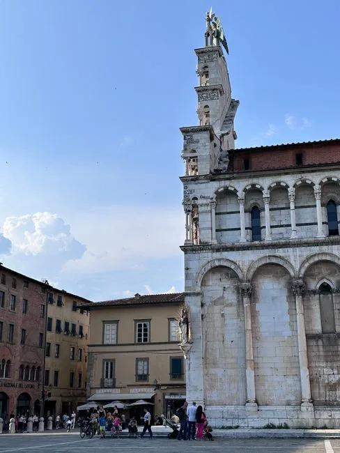 Morning market stalls with fresh produce at Piazza San Michele, Lucca
