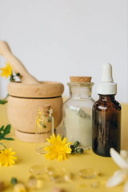Flacons et mortier avec fleurs jaunes, produits naturels spa Dolomites