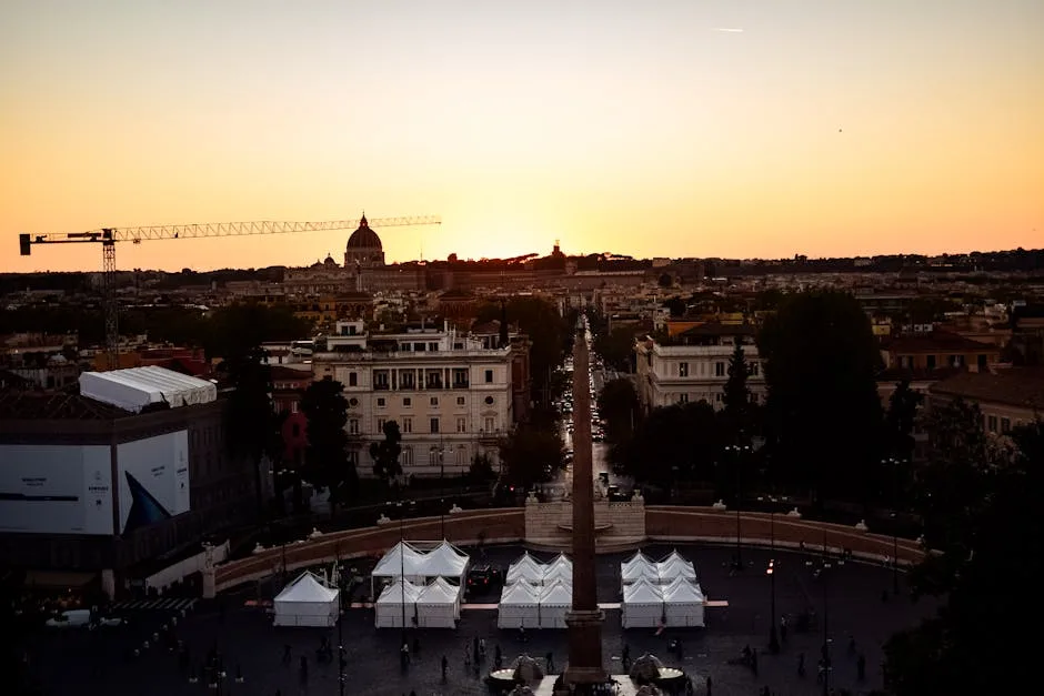 Coucher de soleil sur Rome, obélisque de la Piazza del Popolo et dôme