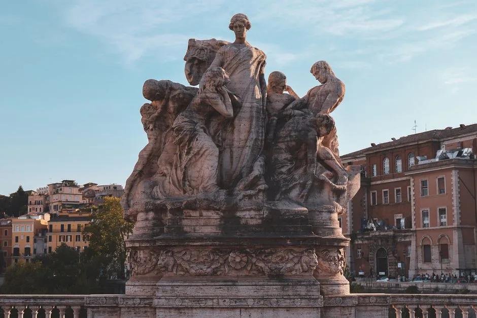 Groupe sculpté sur un pont bordant le Tibre à Rome.