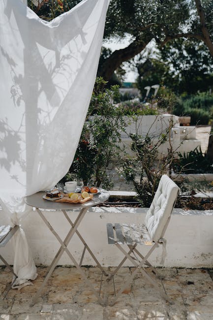 Shaded breakfast terrace with lemons and coffee in Lecce