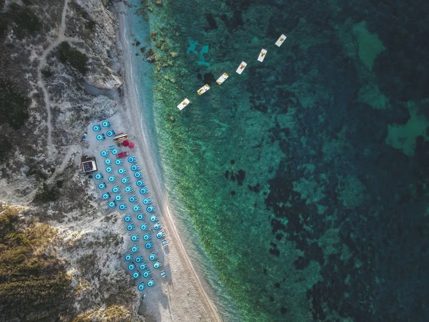 Pescoluse white sand and shallow turquoise water with sunbeds