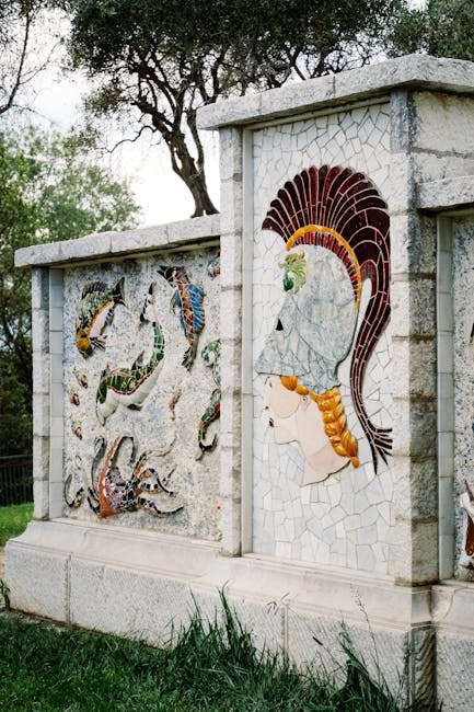 Decorative mosaic panel depicting helmeted profile and sea creatures in an Amalfi Coast garden