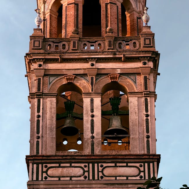 Church bell tower in the mist