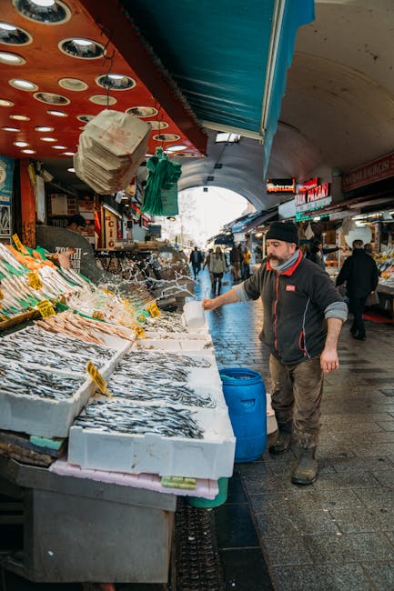 Fishmonger at Ballarò market with fresh catch