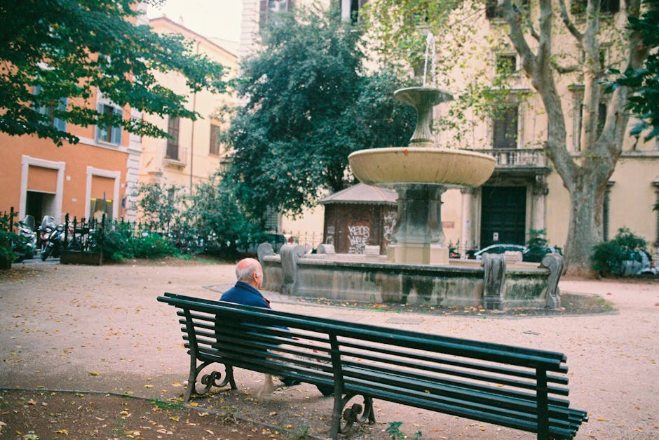 Piazza Marina with old trees and stone fountain
