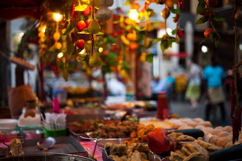 Street food arancino at a Palermo market