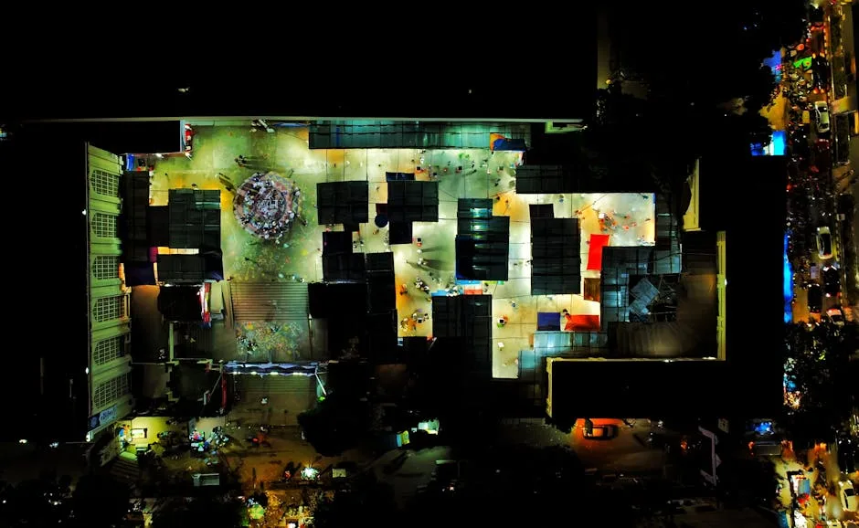 Vue aérienne nocturne d'un marché forain illuminé à Palermo