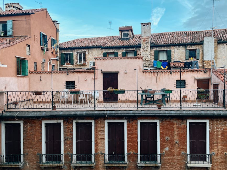 Kalsa district rooftop terrace view over historic balconies