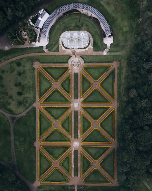 Aerial view of Padua Botanical Garden's symmetrical parterre and glass greenhouse