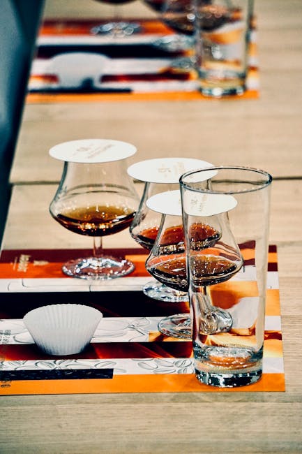 Glasses with grappa samples arranged for a tasting in Bassano del Grappa
