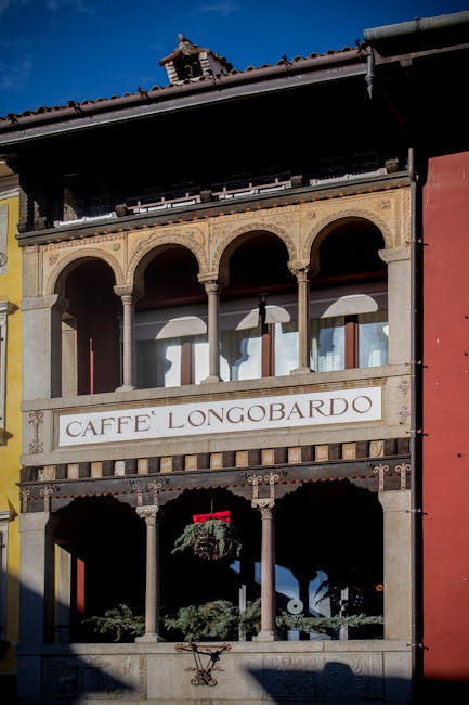 Caffè Longobardo façade with arched balcony in Padua.
