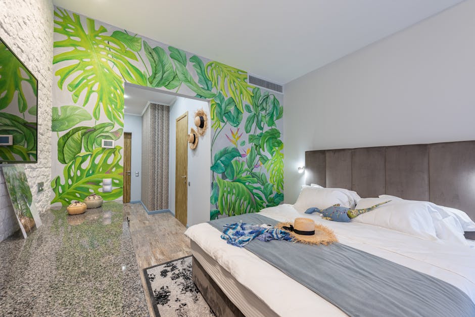 Chambre familiale au Lac de Garde avec fresque de feuilles tropicales