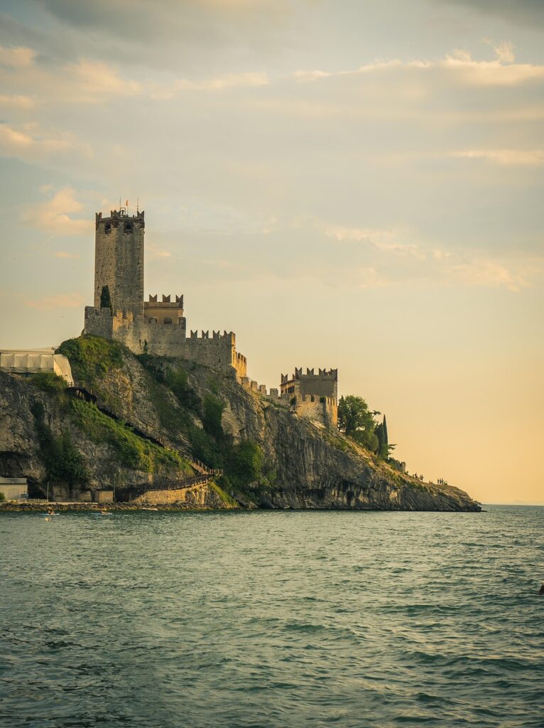 Medieval Malcesine castle perched on a rocky Lake Garda promontory