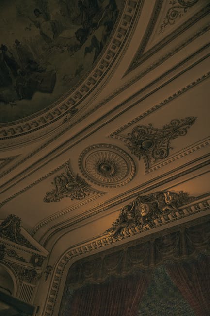 Decorative painted ceiling and plasterwork inside Parma theater auditorium