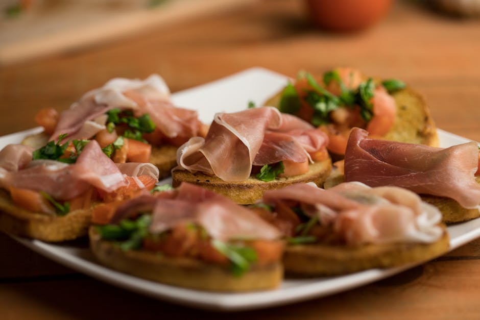 platter of Parma prosciutto and cheese
