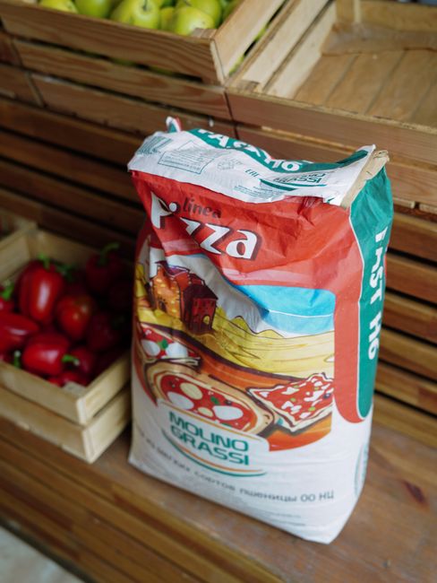 Shopping bag with Italian groceries and market purchases from Parma