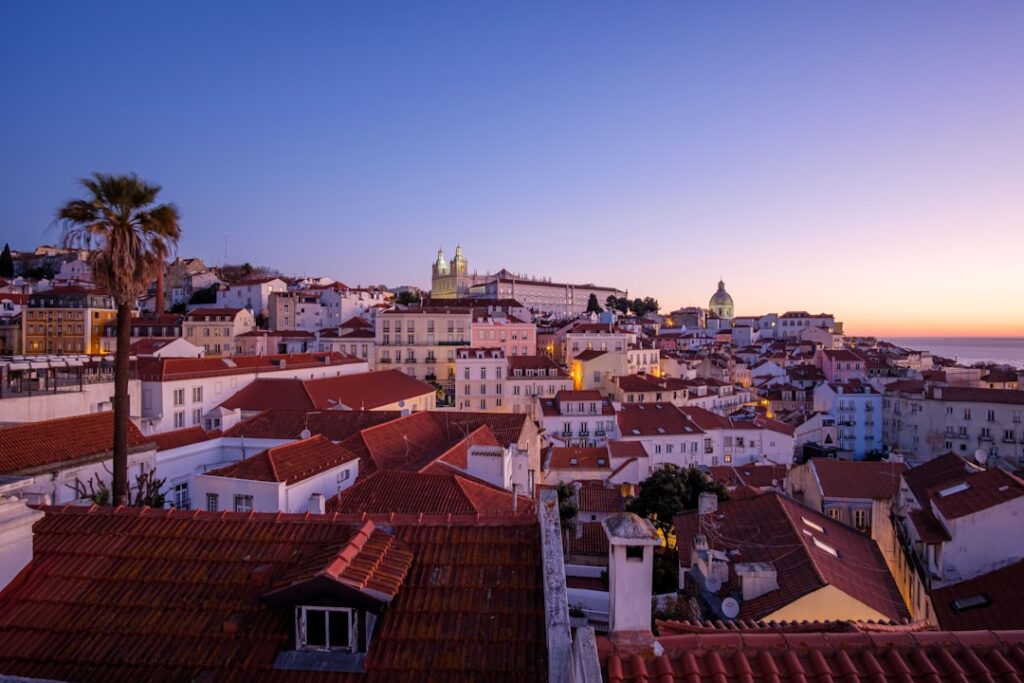 Lisbon Alfama rooftops sunset view