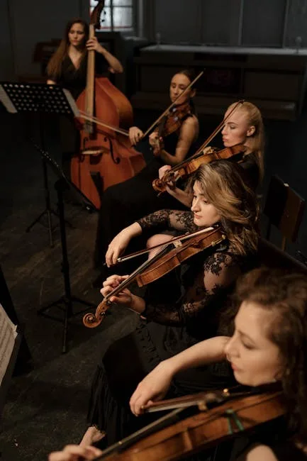 Quatuor à cordes féminin en répétition sur scène pour festival à Bergame