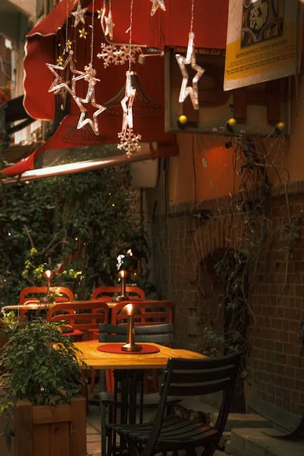 Café bohème en terrasse étroite décorée d'étoiles lumineuses
