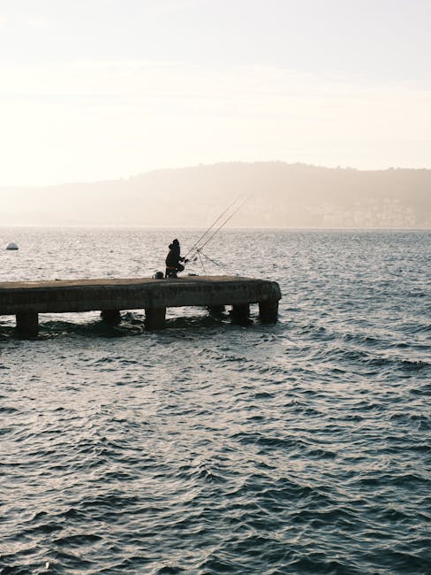 Fisherman preparing bait in the early morning