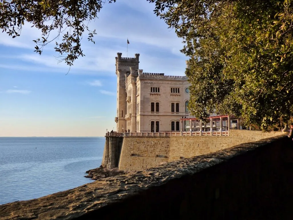Evening light on Miramare Castle and coastal wall in Trieste