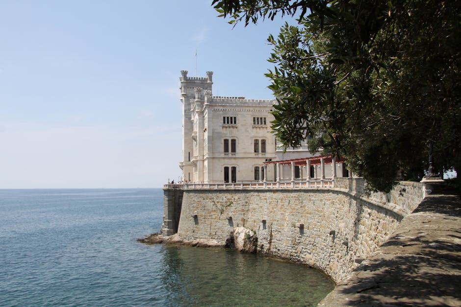 Miramare Castle exterior cliff view sunset
