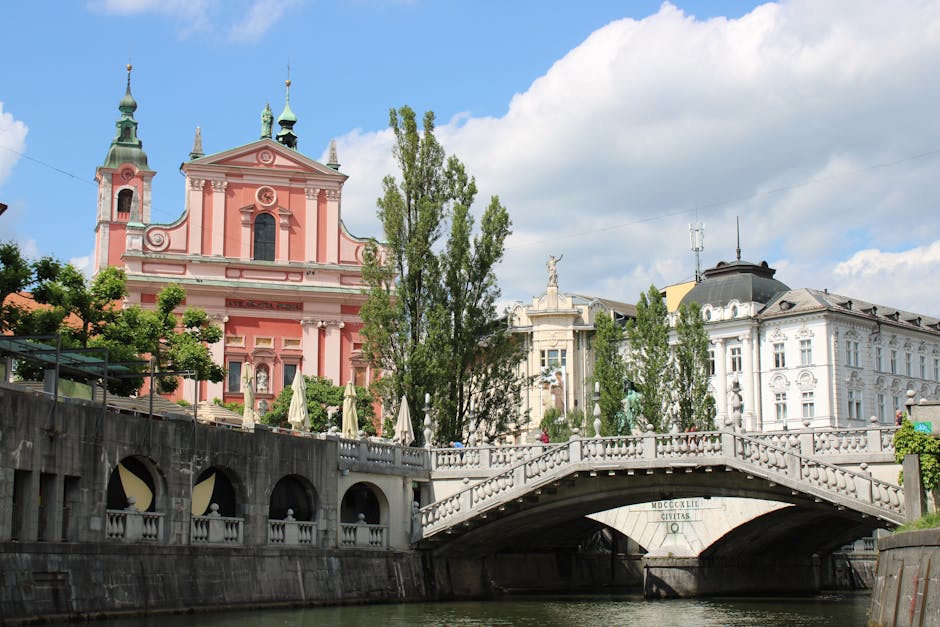 Morning view of the Triple Bridge and pastel facades
