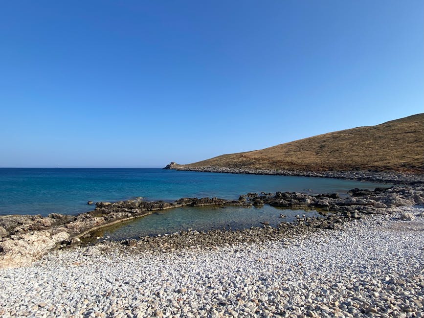 Sistiana Bay with small pebble beach and crystal water