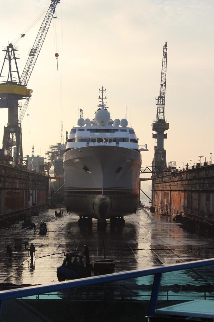 Cranes at Trieste shipyard at sunset, Arsenale Vecchio