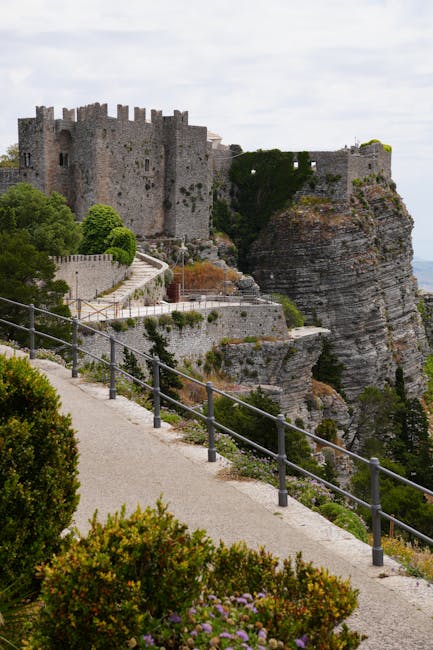 Stone fortress perched on a rocky cliff path in the Aeolian Islands