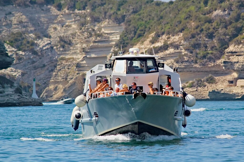 Cruise boat departing Marina Corta