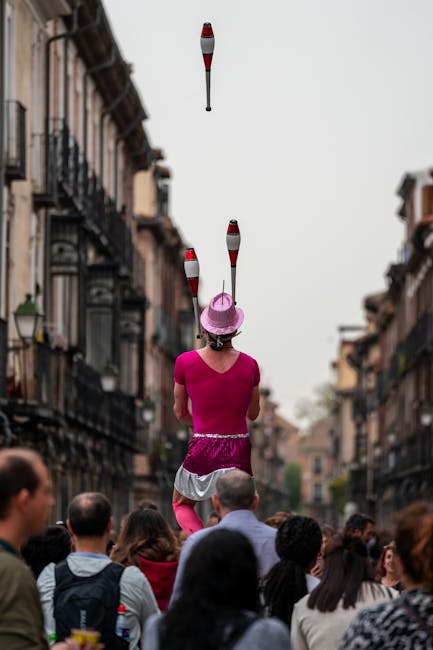 Street performers juggling in Ravenna’s historic center during carnival