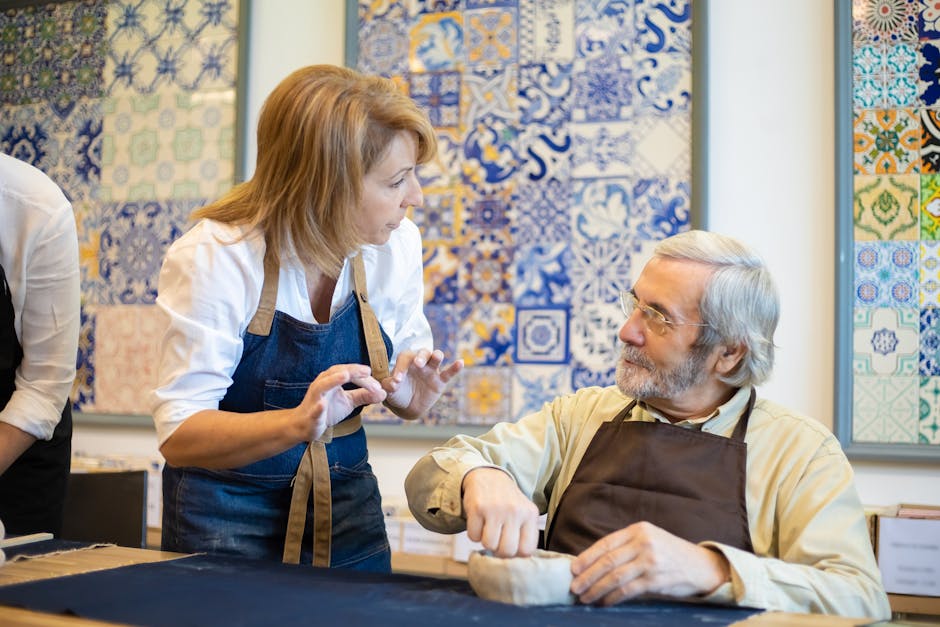 Visitors creating Dante-themed mosaics in a workshop