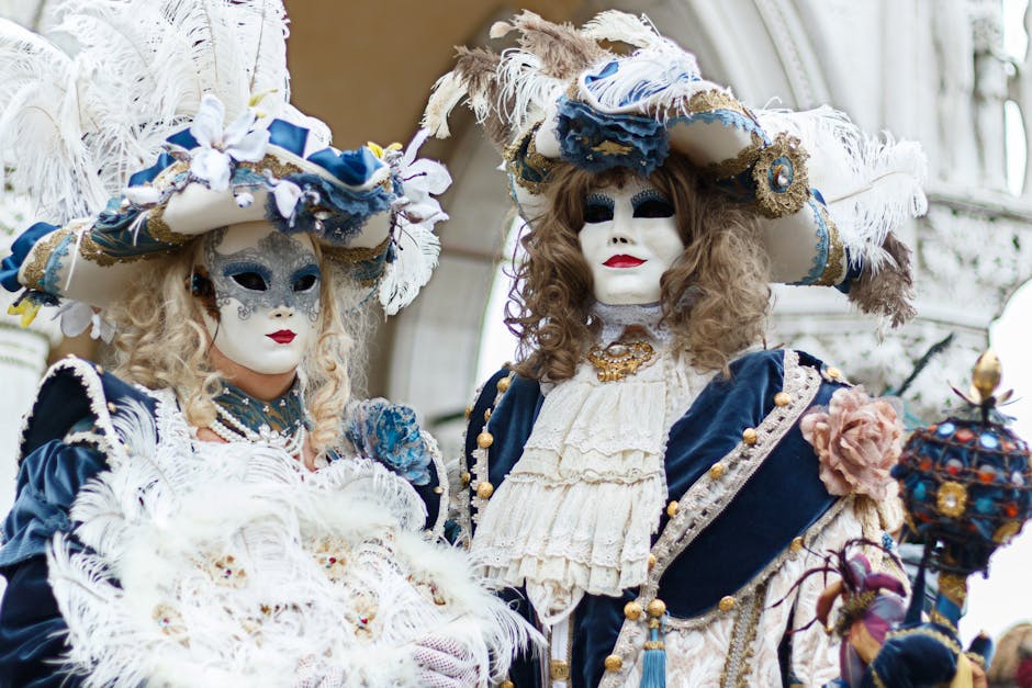 Elegant dancers at a masked ball in Teatro Alighieri